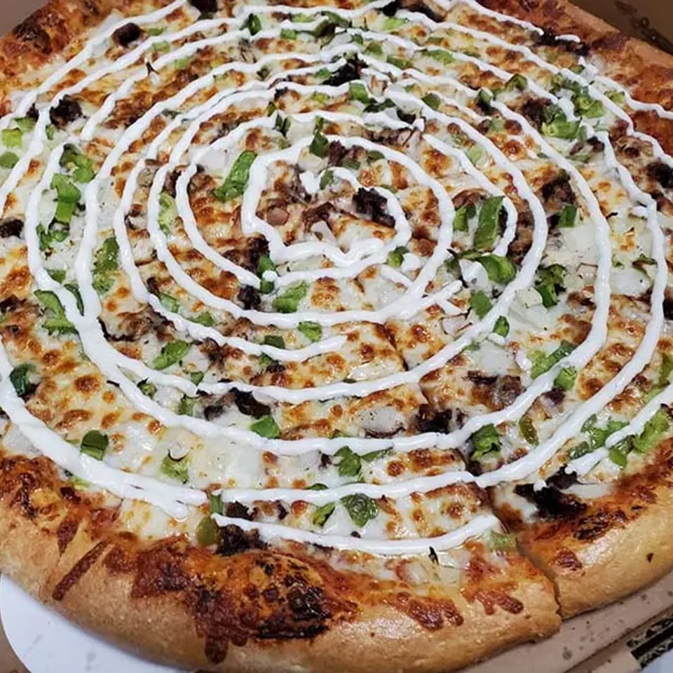 Indulge in Our Pizza