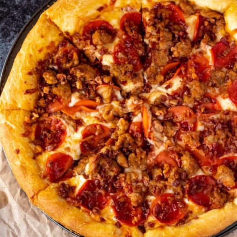 Indulge in Our Meat Lovers Pizza